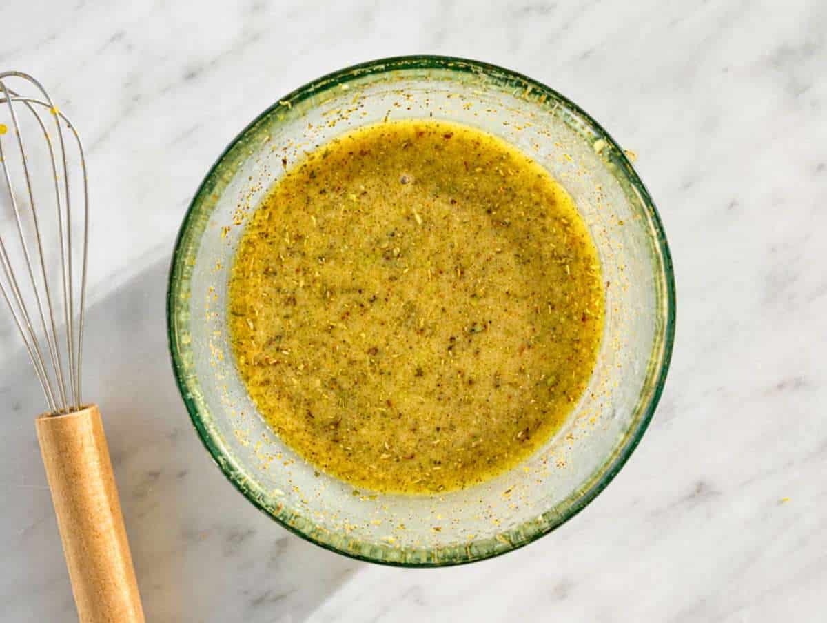 Step 2 Lemon mustard dressing whisked with olive oil, garlic, oregano, and honey.
